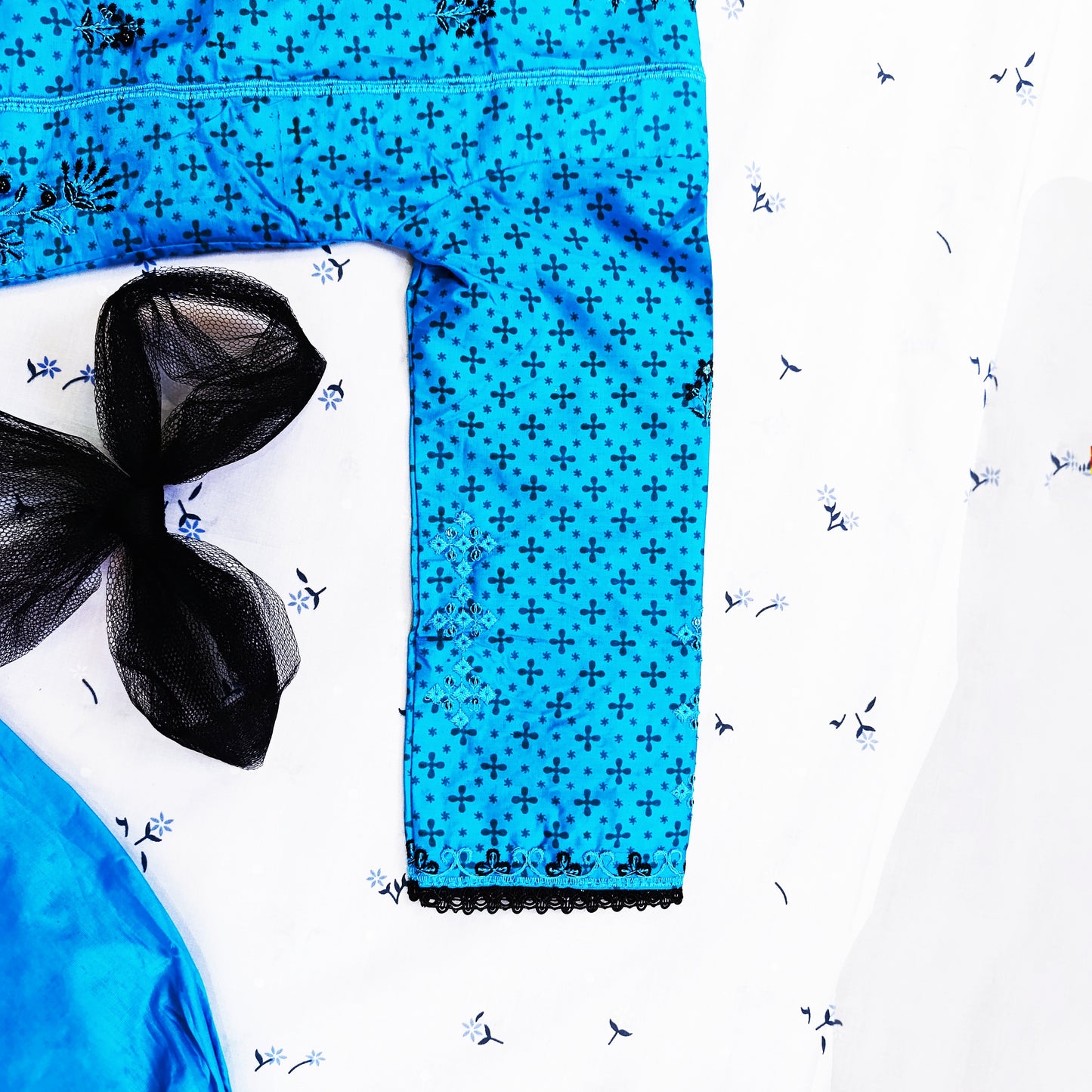 Vibrant Blue Cotton Suit Set with Black Floral Embroidery and Net Dupatta