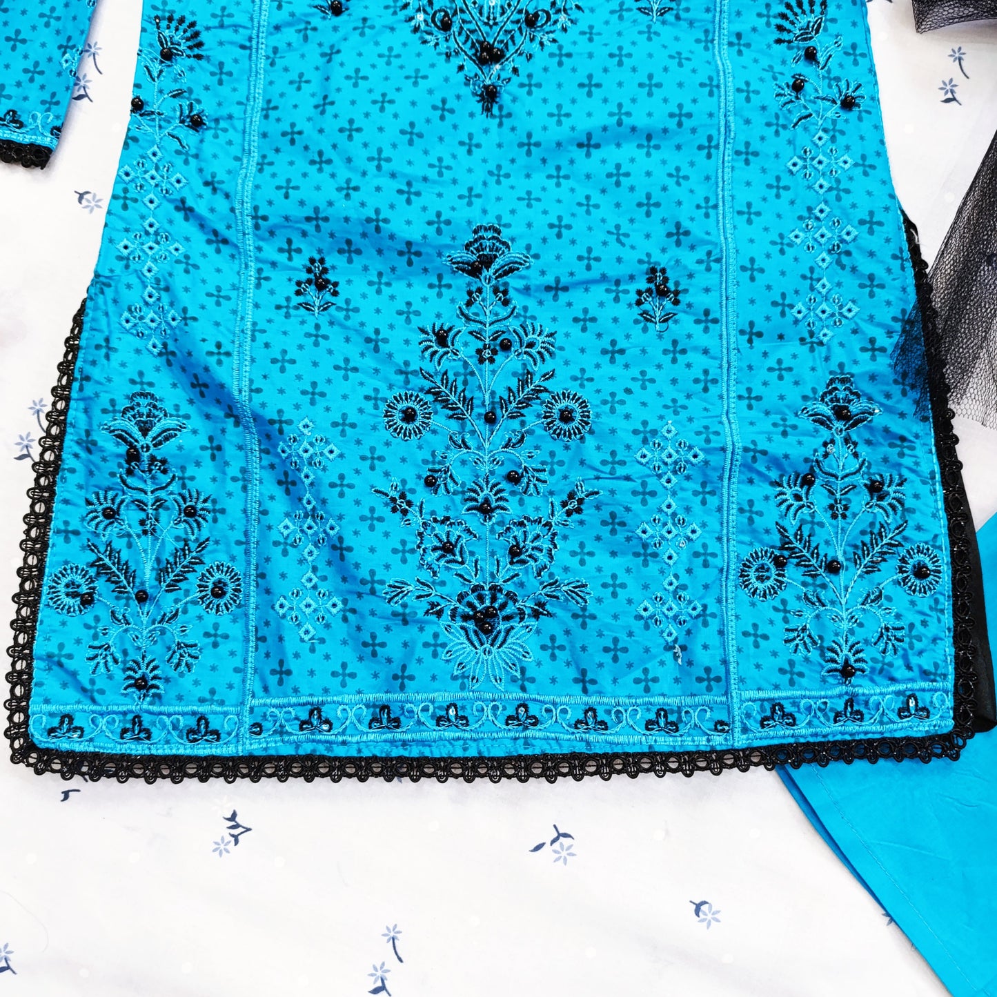 Vibrant Blue Cotton Suit Set with Black Floral Embroidery and Net Dupatta